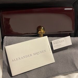Alexander McQueen Burgundy Wallet with Gold Skull Accent